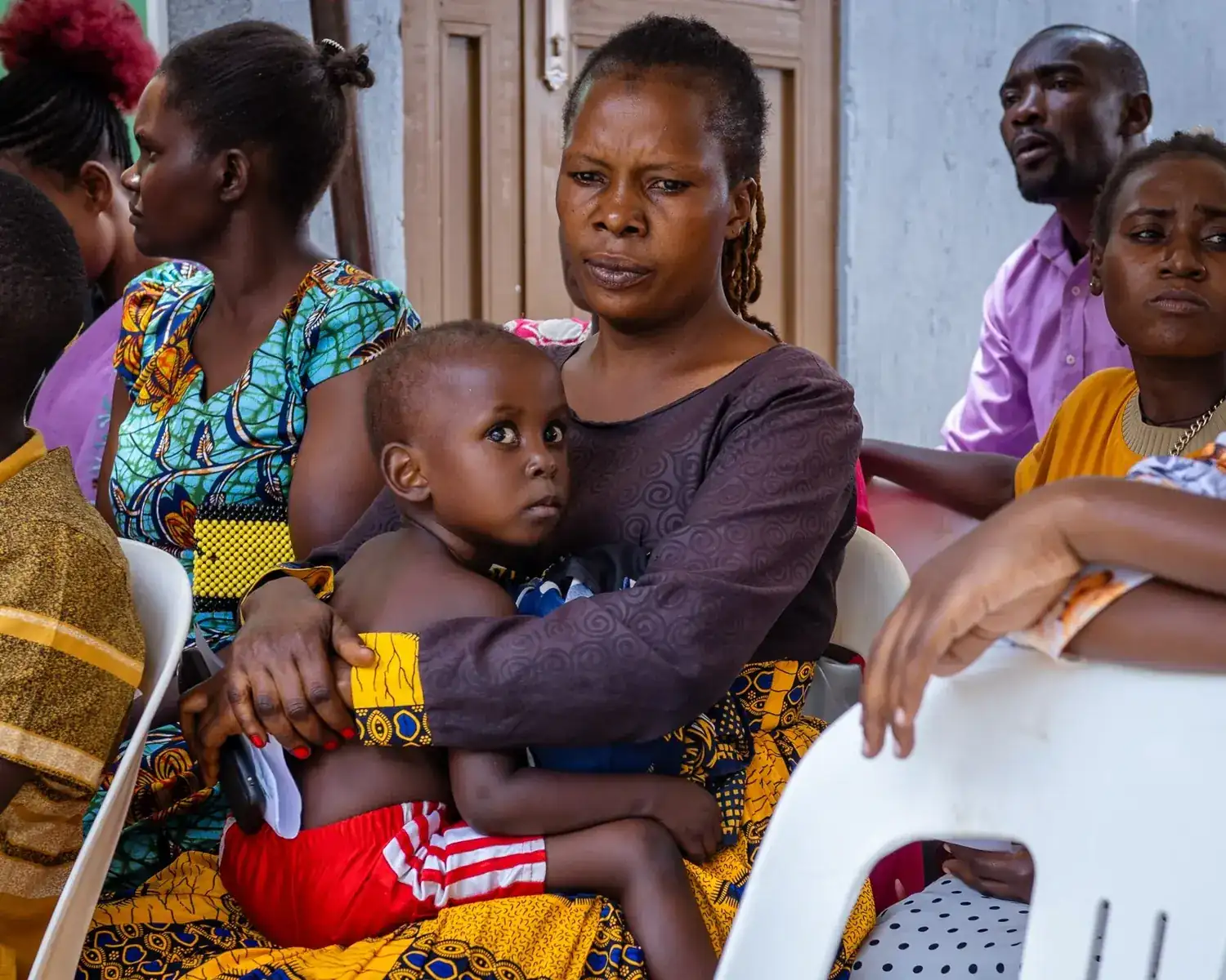 A mother and her child at a community health camp